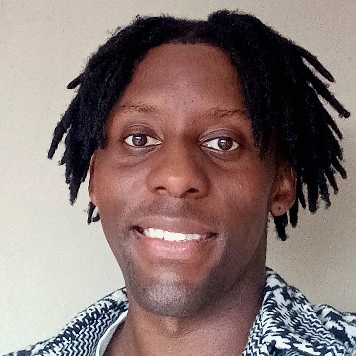 Tawanda smiling in portrait photo